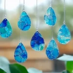 Blue Crayon Raindrop Suncatchers: A Dreamy Craft for Rainy Days & Sunny Windows - Savory Splash